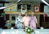 Genevieve Escher, Dorothy Dooley and Helen Cairns, sisters-in-law.  Dorothy's 80th birthday party at Monticello's American Legion building, July 1992.